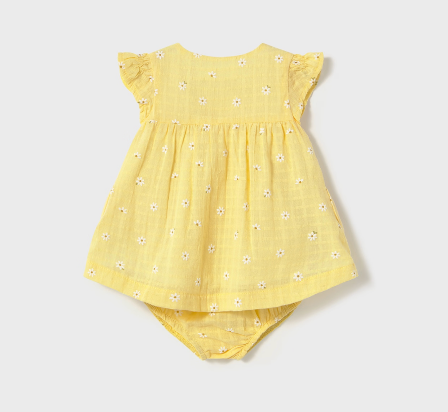 Back of yellow daisy dress for babies