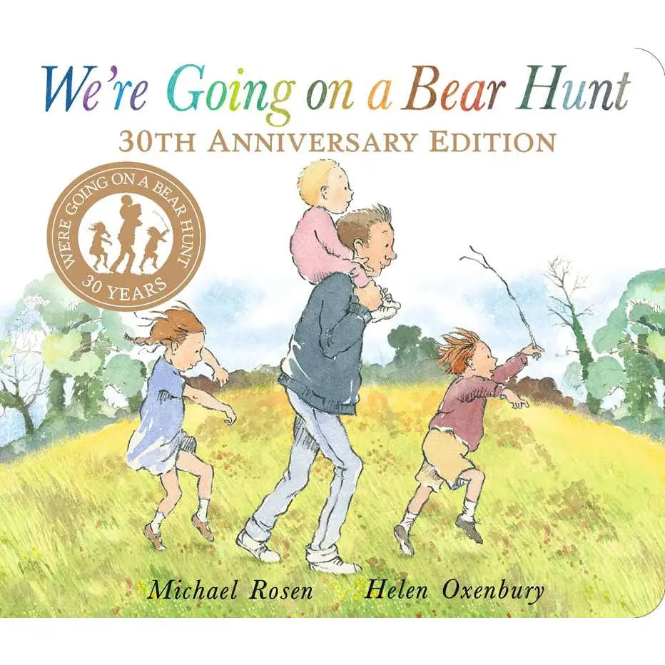 Book cover of 'We're Going on a Bear Hunt' with illustrations of children running outdoors.