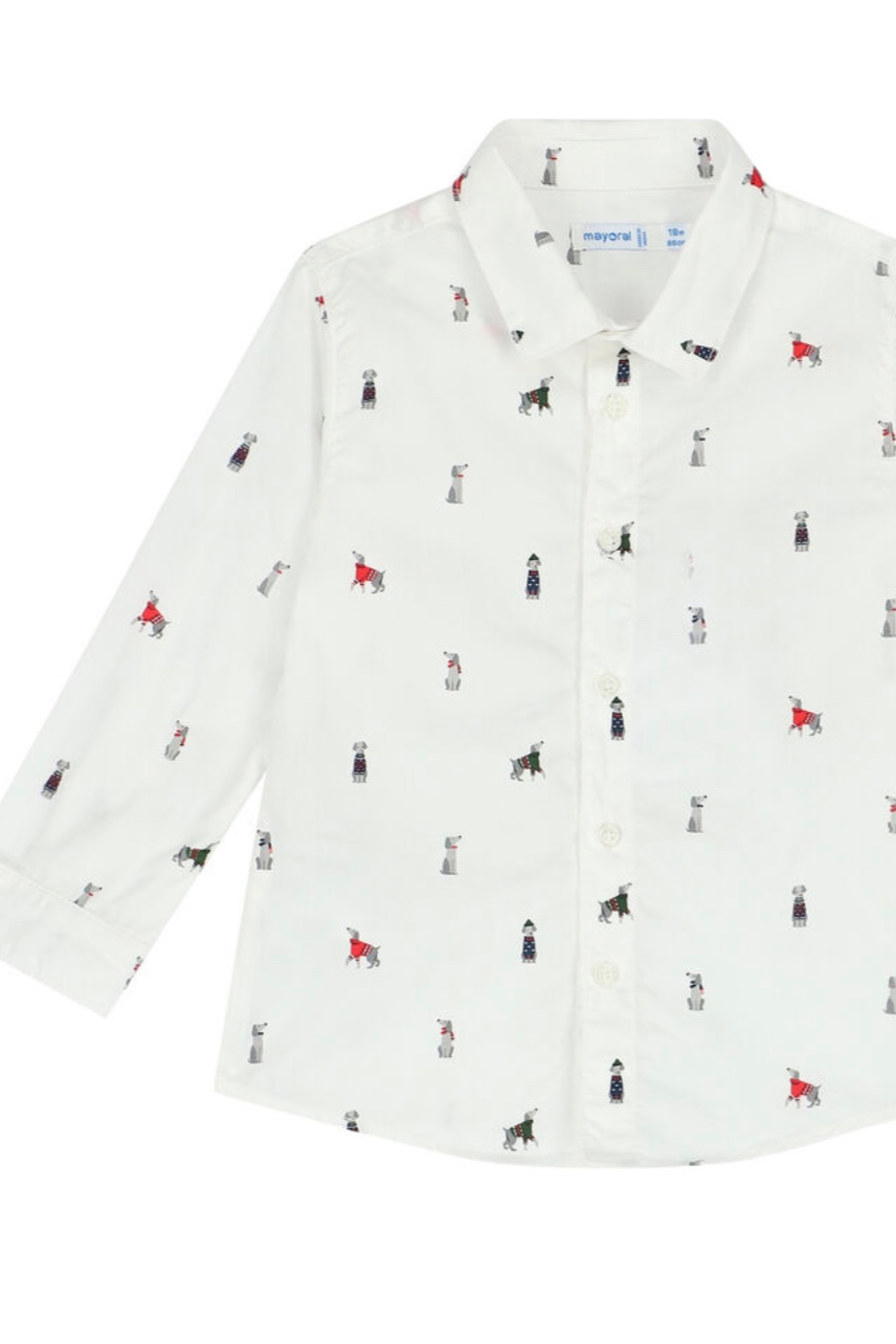 A white button-up sweater with an all-over print of different colored dogs in various poses.