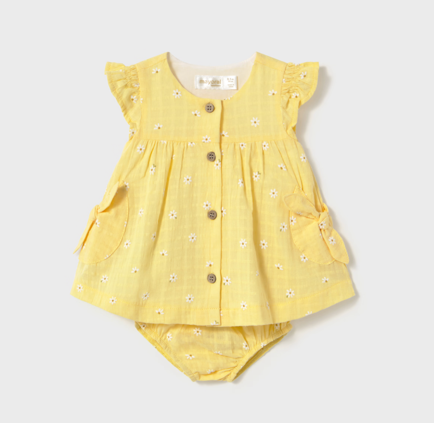 Front of daisy yellow baby dress