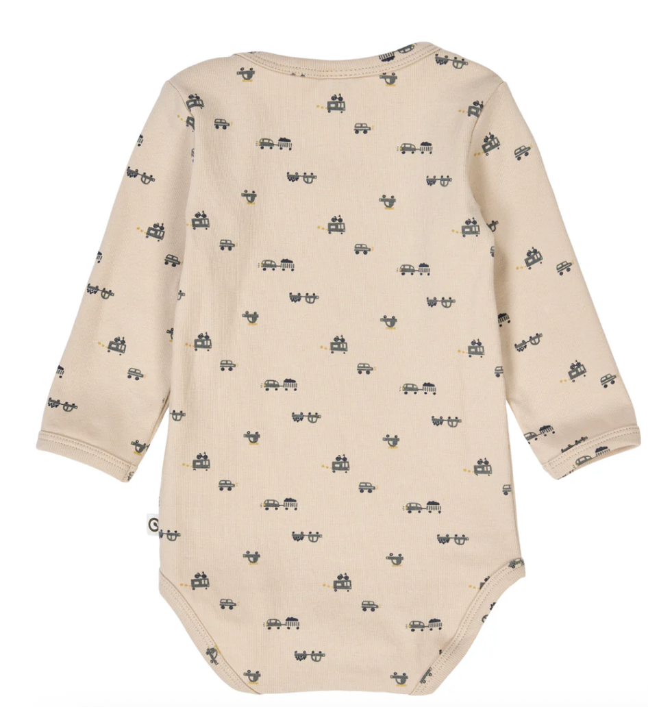 Backside view of beige baby bodysuit with black car pattern on a white background