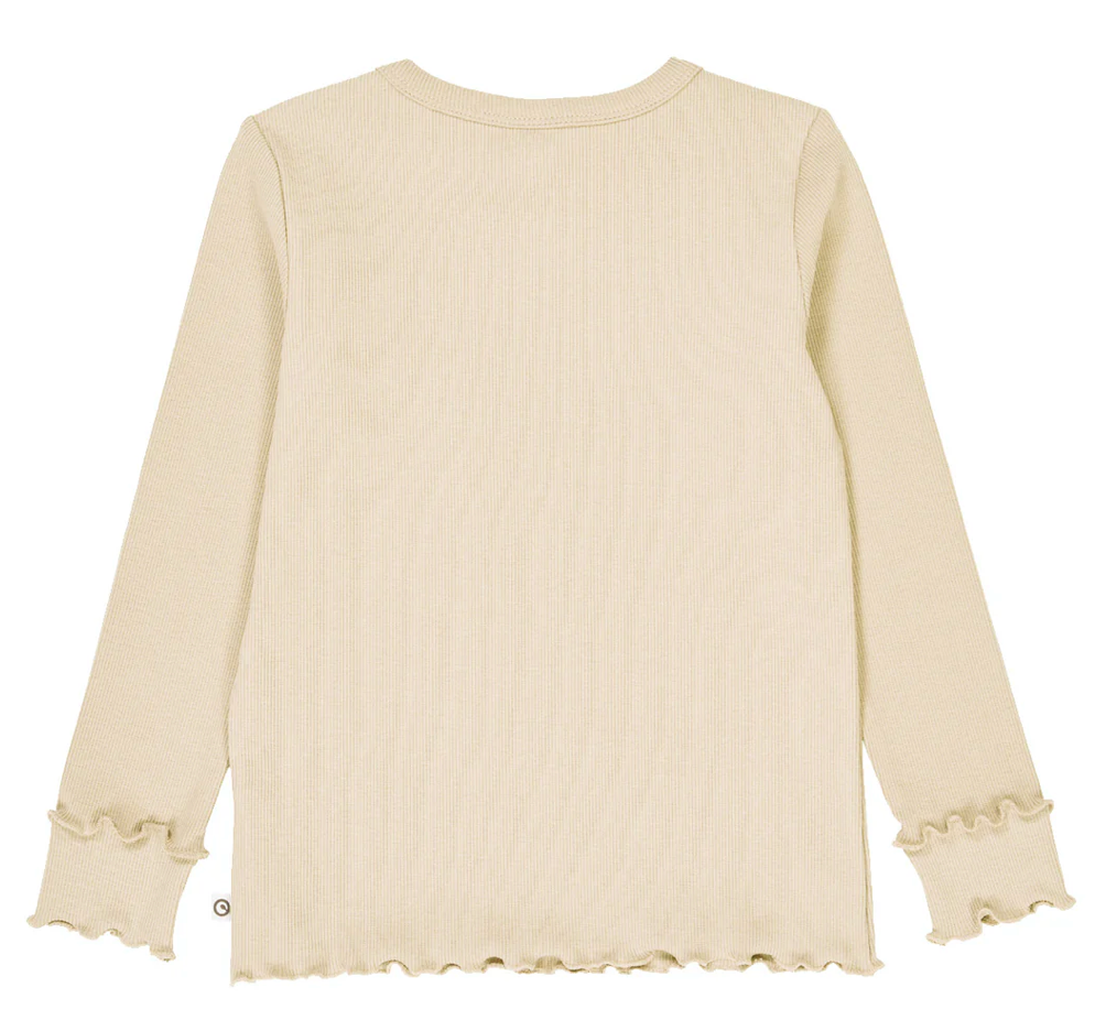 Backside view of Green Cotton Group beige long-sleeve top with ruffled trim on a white background