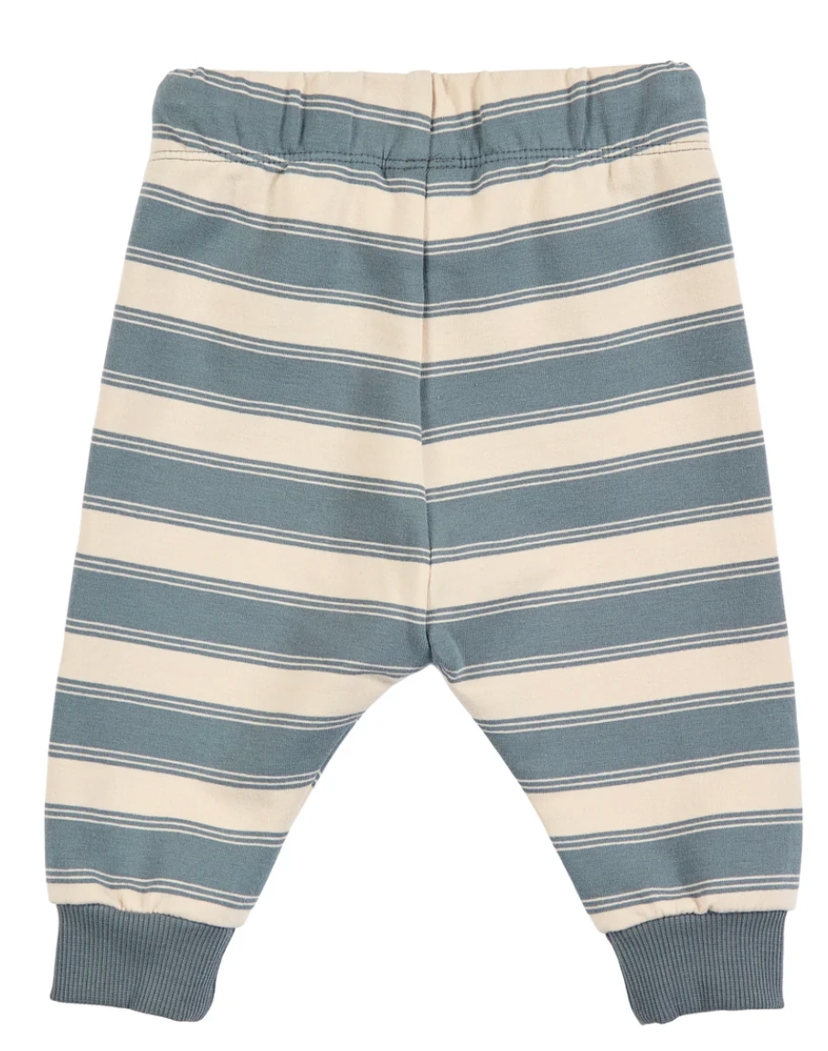 Backside view of Green Cotton Group striped baby pants with blue and beige stripes on a white background