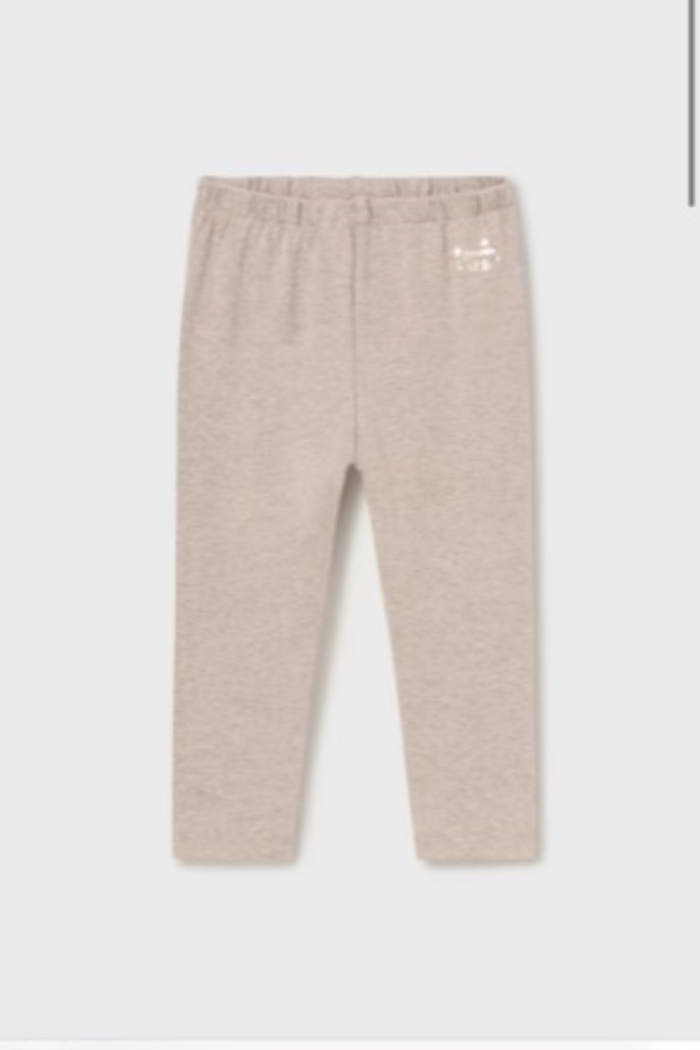 A pair of Mayoral baby girl leggings in beige.