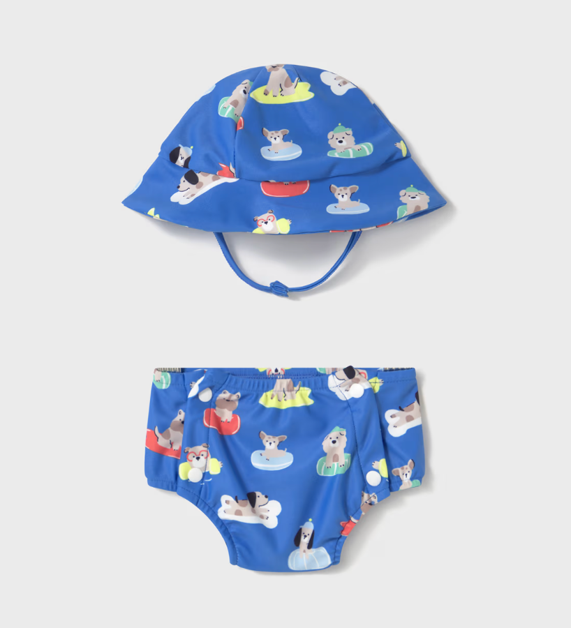 Blue children's swim hat and diaper set with animal pattern on a light gray background
