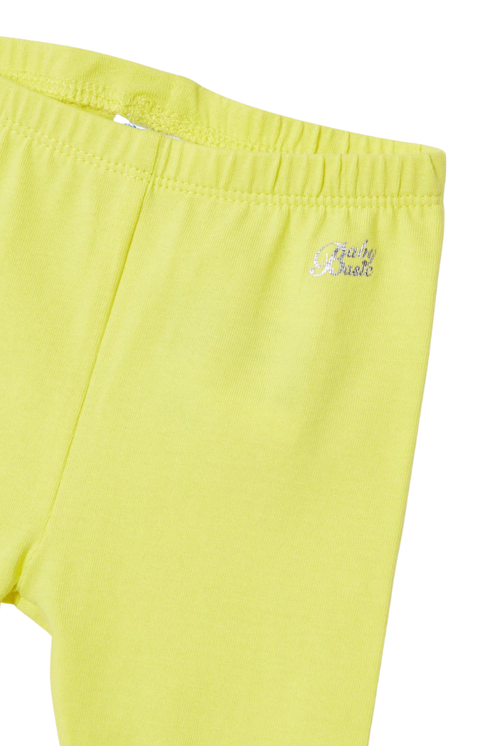 Close up view of Mayoral yellow capri pants with logo