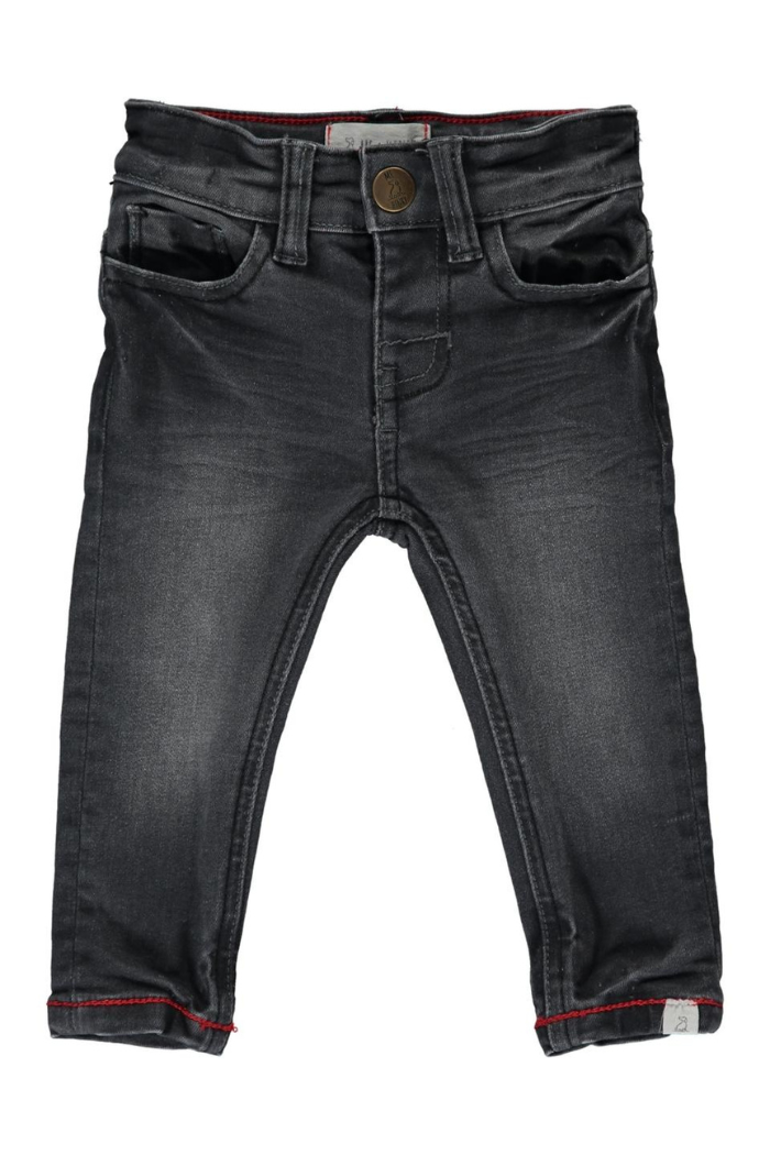 A pair of Me & Henry soft charcoal colored baby jeans with a red waistband and red detailing on the pockets.