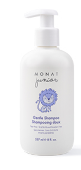 Bottle of Monat Junior Gentle Shampoo with a pump dispenser, featuring a label with a cartoon lion and the product name.