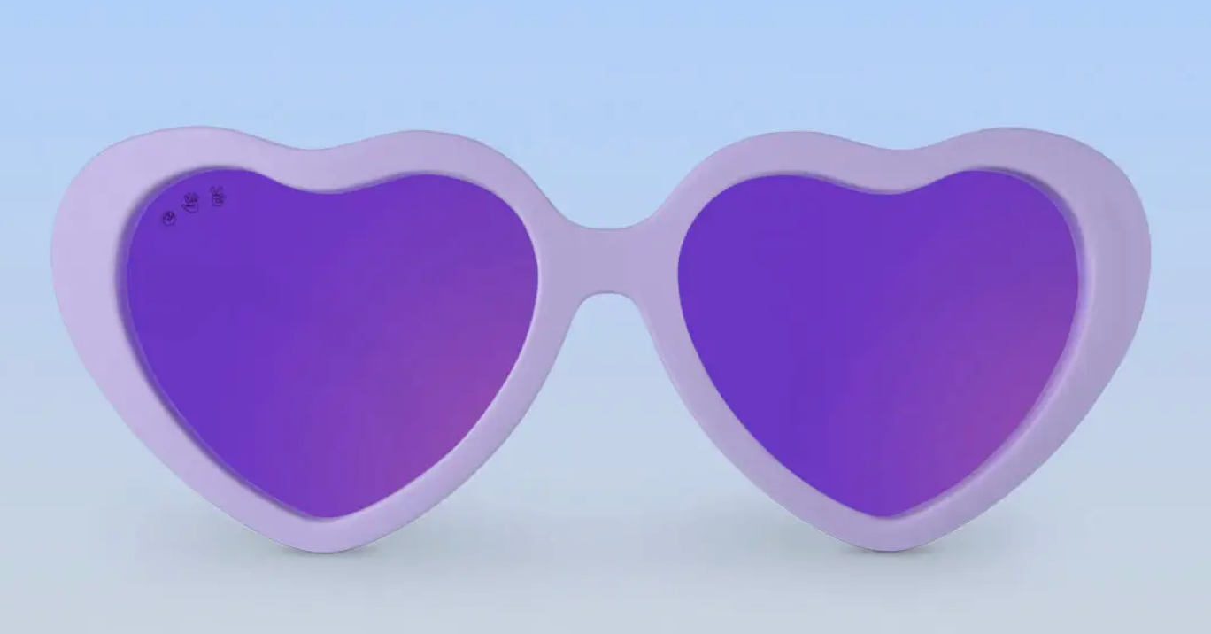 Ro Sham Bo heart-shaped sunglasses with purple frame and lenses on a light blue background