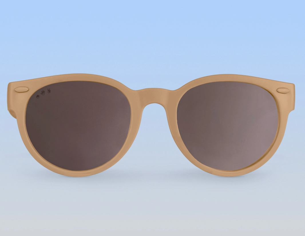 Ro Sham Bo Latte round sunglasses with dark lenses on a light blue background