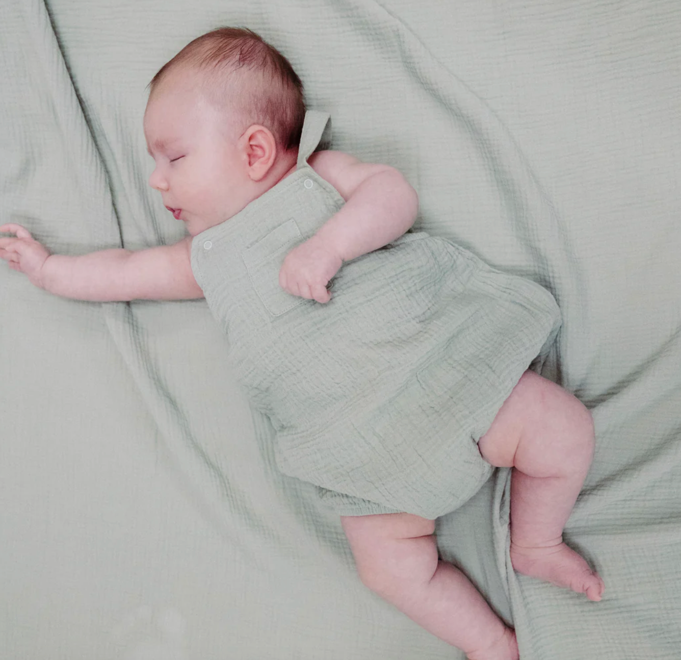 angel dear light green muslin overall on model