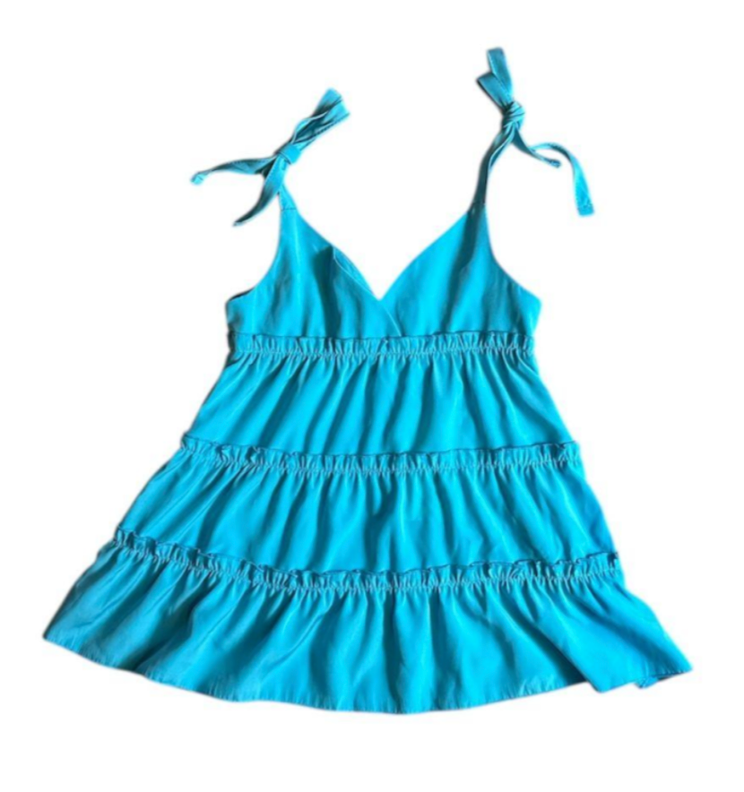 Blue dress with thin straps on a white background