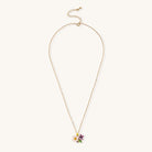 Delicate 18K gold plated necklace featuring colorful enamel flowers in pink and white with green leaves on chain