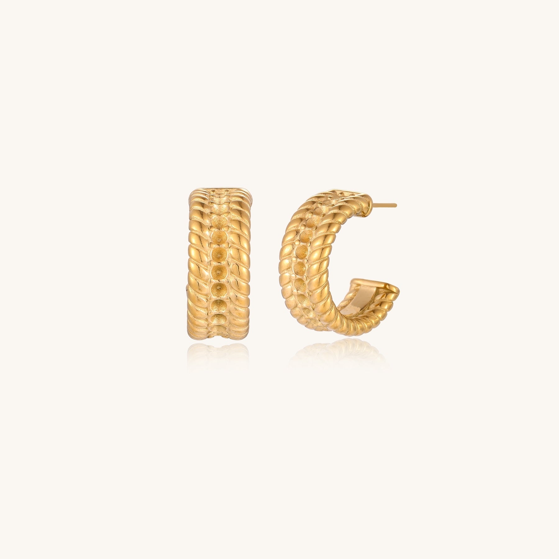 Close-up of 14K gold plated textured hoop earrings with rope pattern against cream background showing convertible design