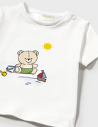 Close up of the shirt in the 3-piece baby swim set with bear on it.