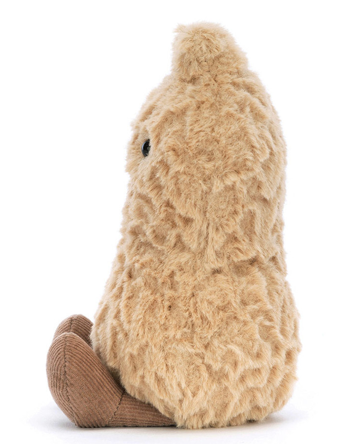 Sideview of Peanut Jellycat plush toy resembling a brown bear on a white background