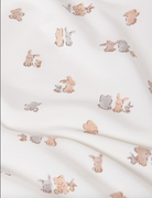 Close of the animal print on white swaddle blanket