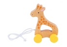 Ganz wooden giraffe toy with wheels and a string on a white background 