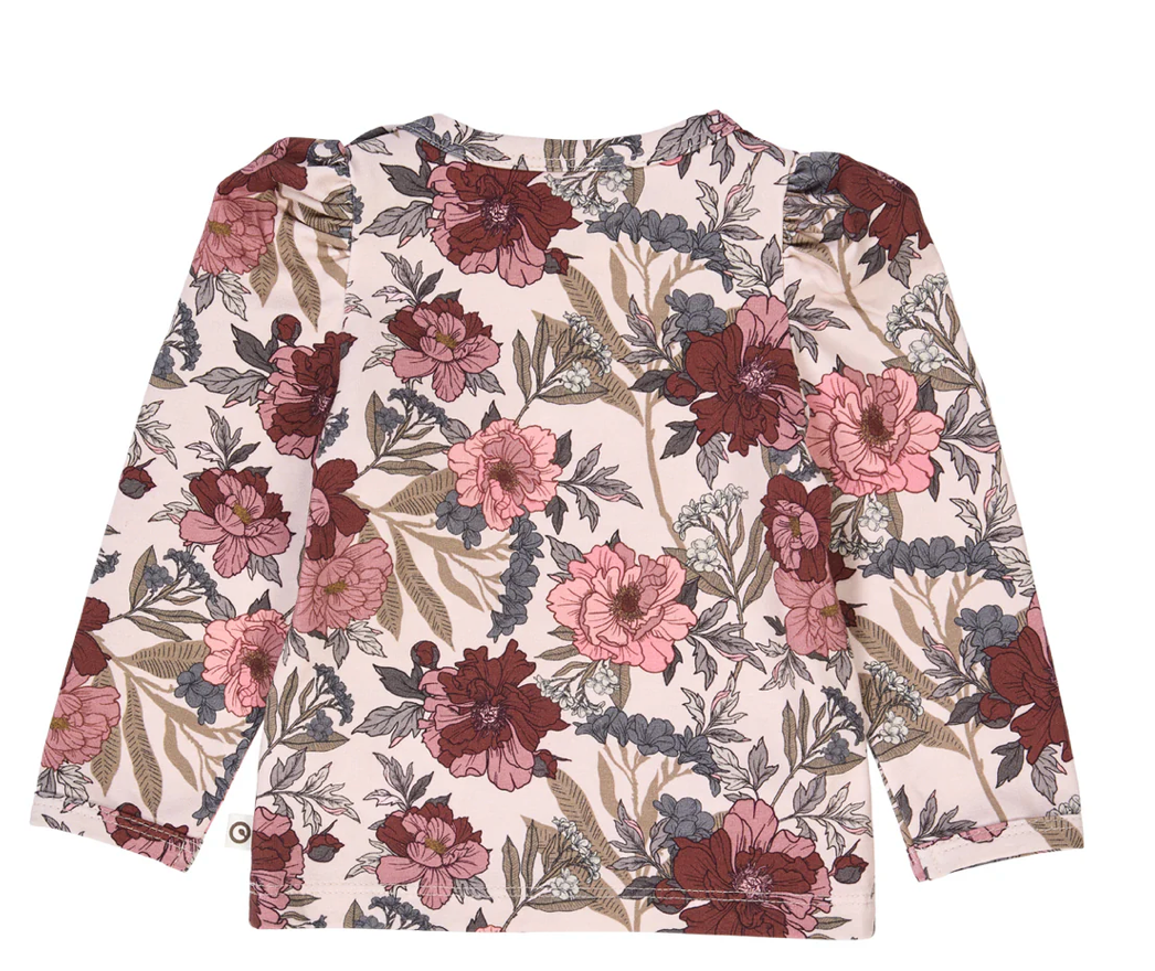 Back side view of Green Cotton Group floral patterned shirt with puff shoulders on a white background