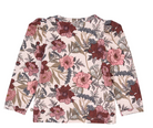 Back side view of Green Cotton Group floral patterned shirt with puff shoulders on a white background