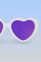 white heart shaped sunglasses with purple polarized lenses 