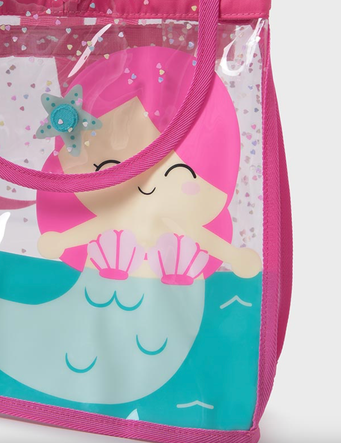 Close up view of the mermaid print on Mayoral transparent mermaid beach bag