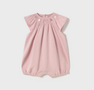 A sleeveless pink romper with ruffles for babies, featuring button closures at the back and crotch.