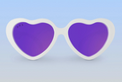 A pair of Ro Sham Bo white heart-shaped sunglasses with purple polarized lenses against a blue background.