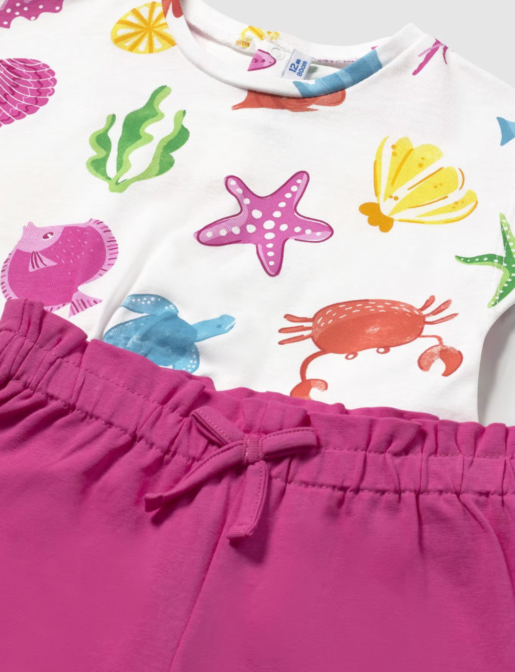 Baby girl outfit with a colorful sea-themed shirt and pink shorts