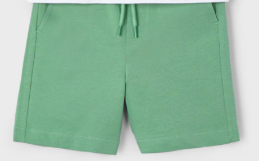 Up close image of green cotton shorts