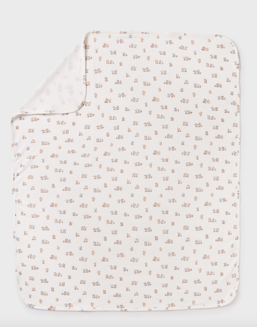 Unfolded animal print swaddle blanket in white