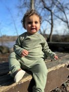 Baby boy Vignette wearing olive green pants and top set